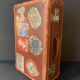 Old travel suitcase and legendary stickers, 1920