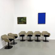 Series of six swivel chairs with organic shell, mottled fabric and base dis
