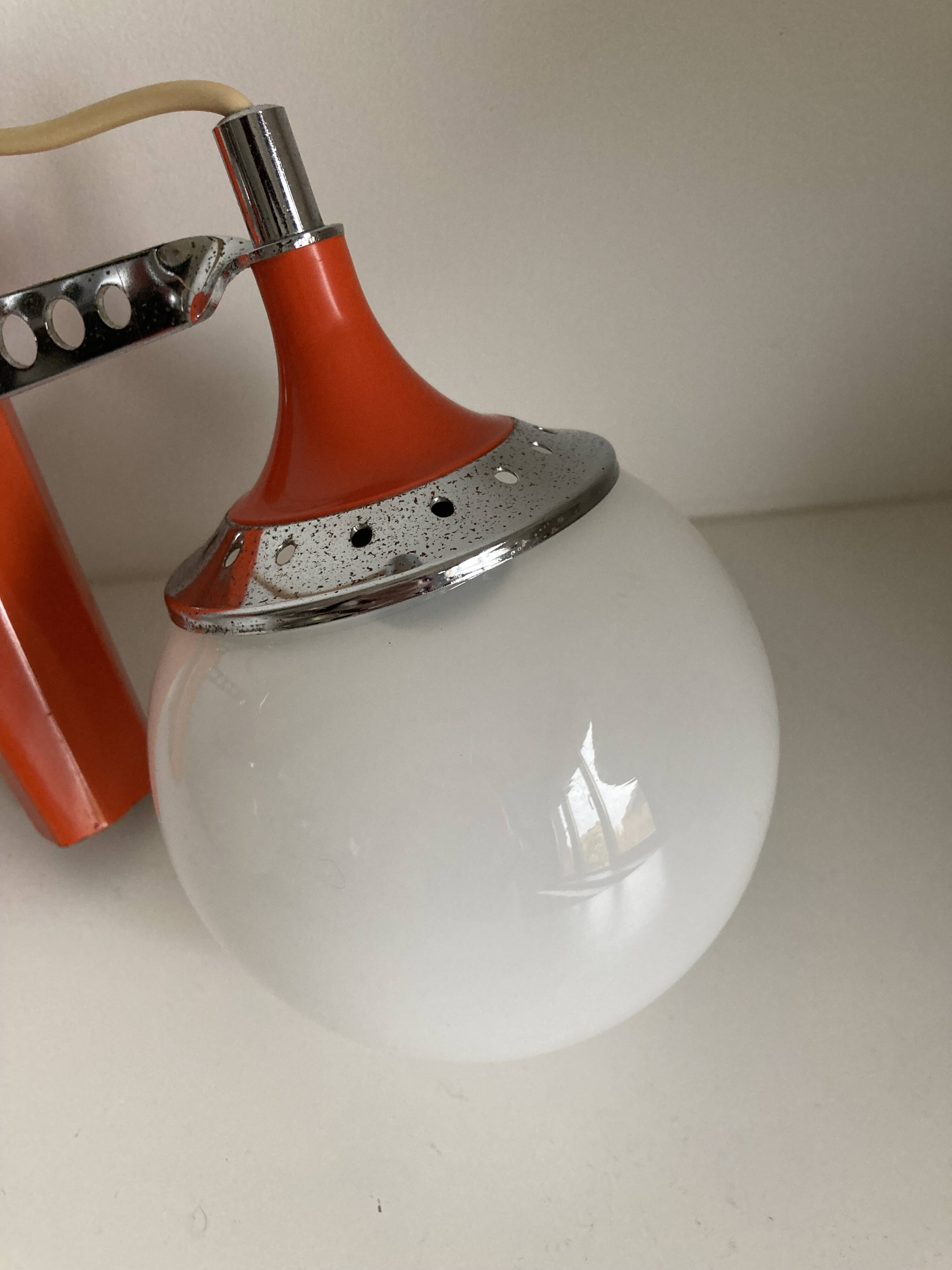 Set of two vintage orange wall lights from the 70s