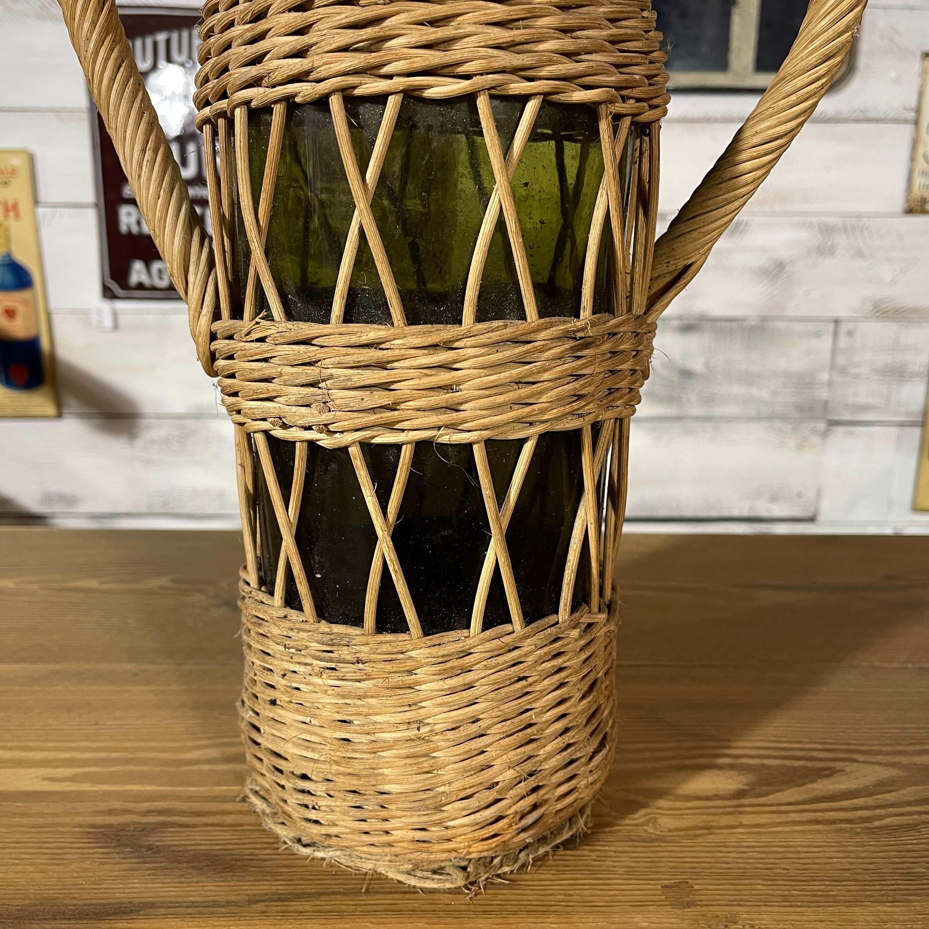 Braided wicker green bottle