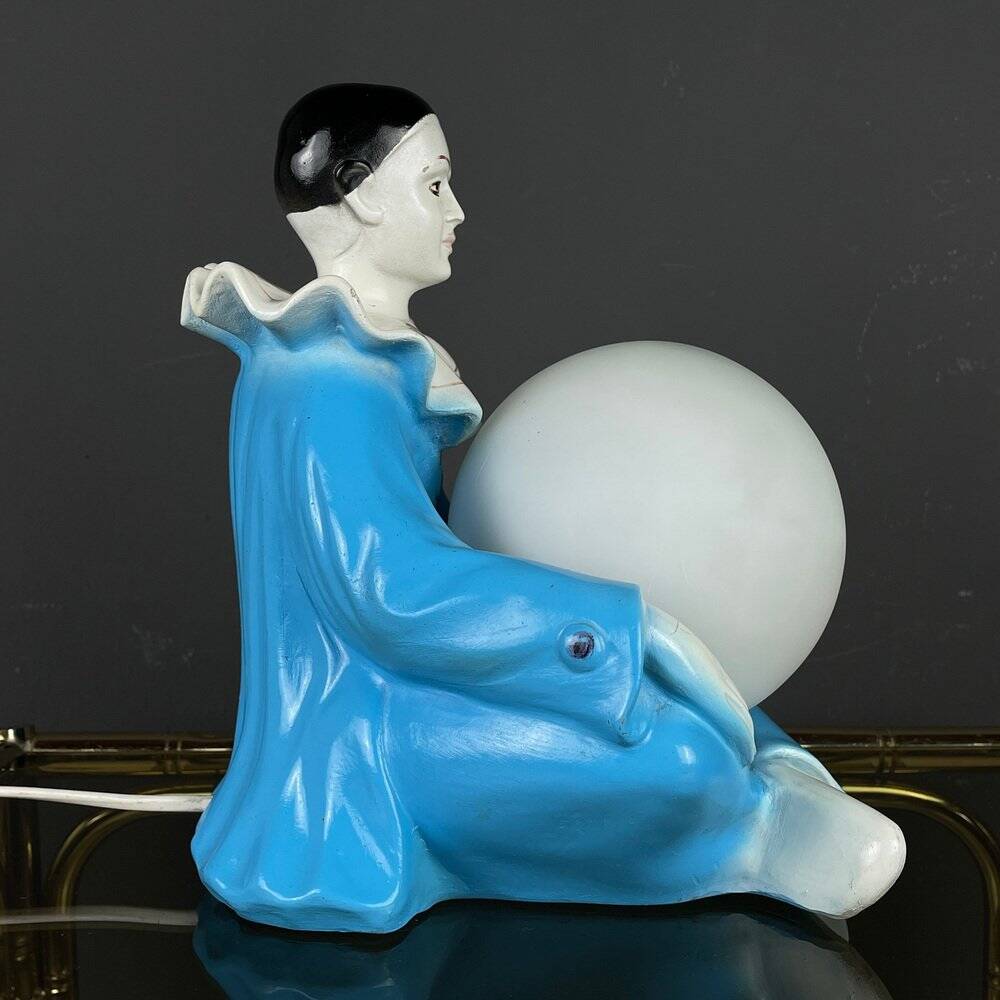 Mid-century Italian Pierrot table lamp in blue ceramic, 1960s.