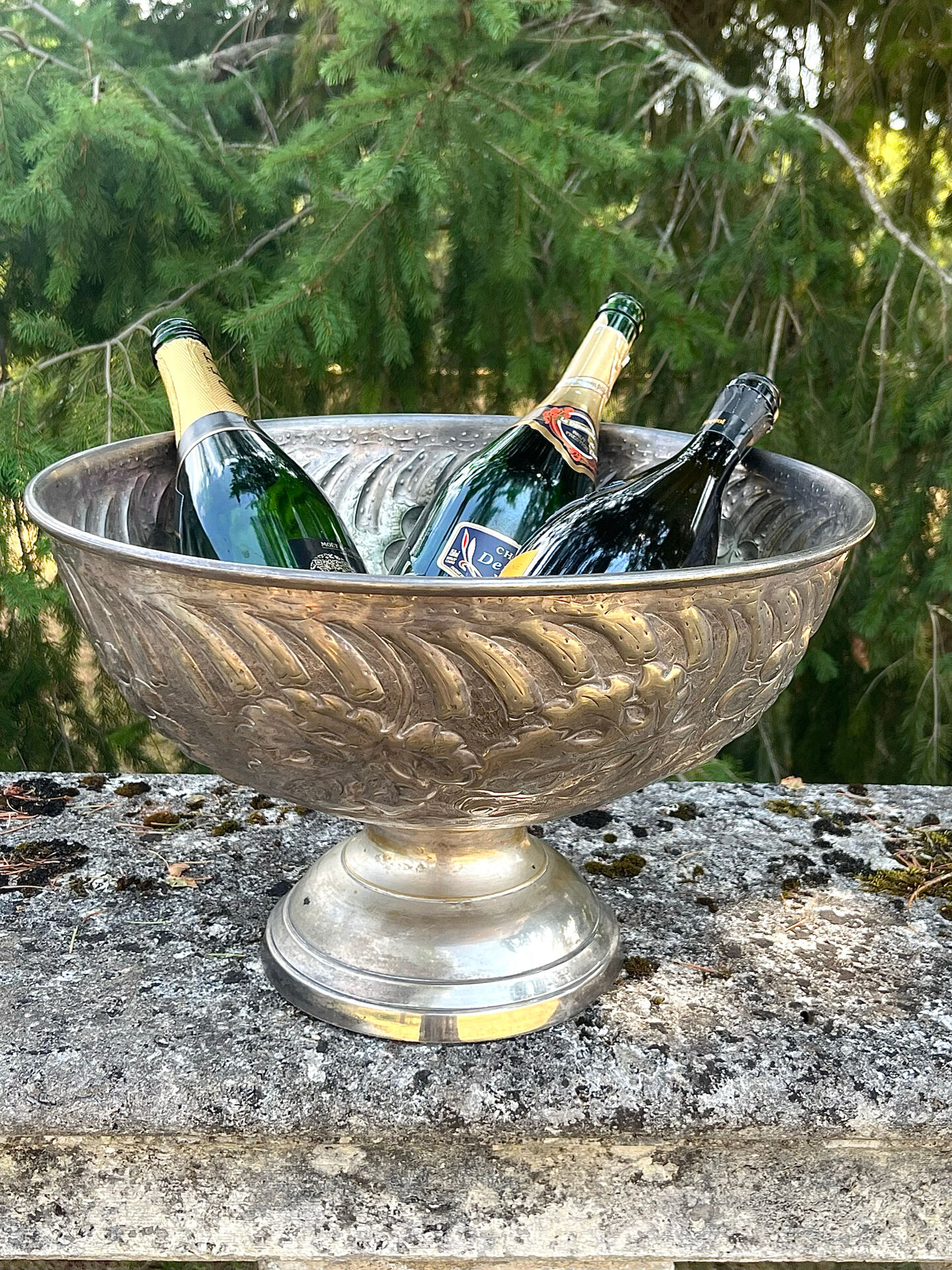Large silver plated champagne cooler bowl on pedestal with grape