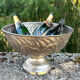Large silver plated champagne cooler bowl on pedestal with grape
