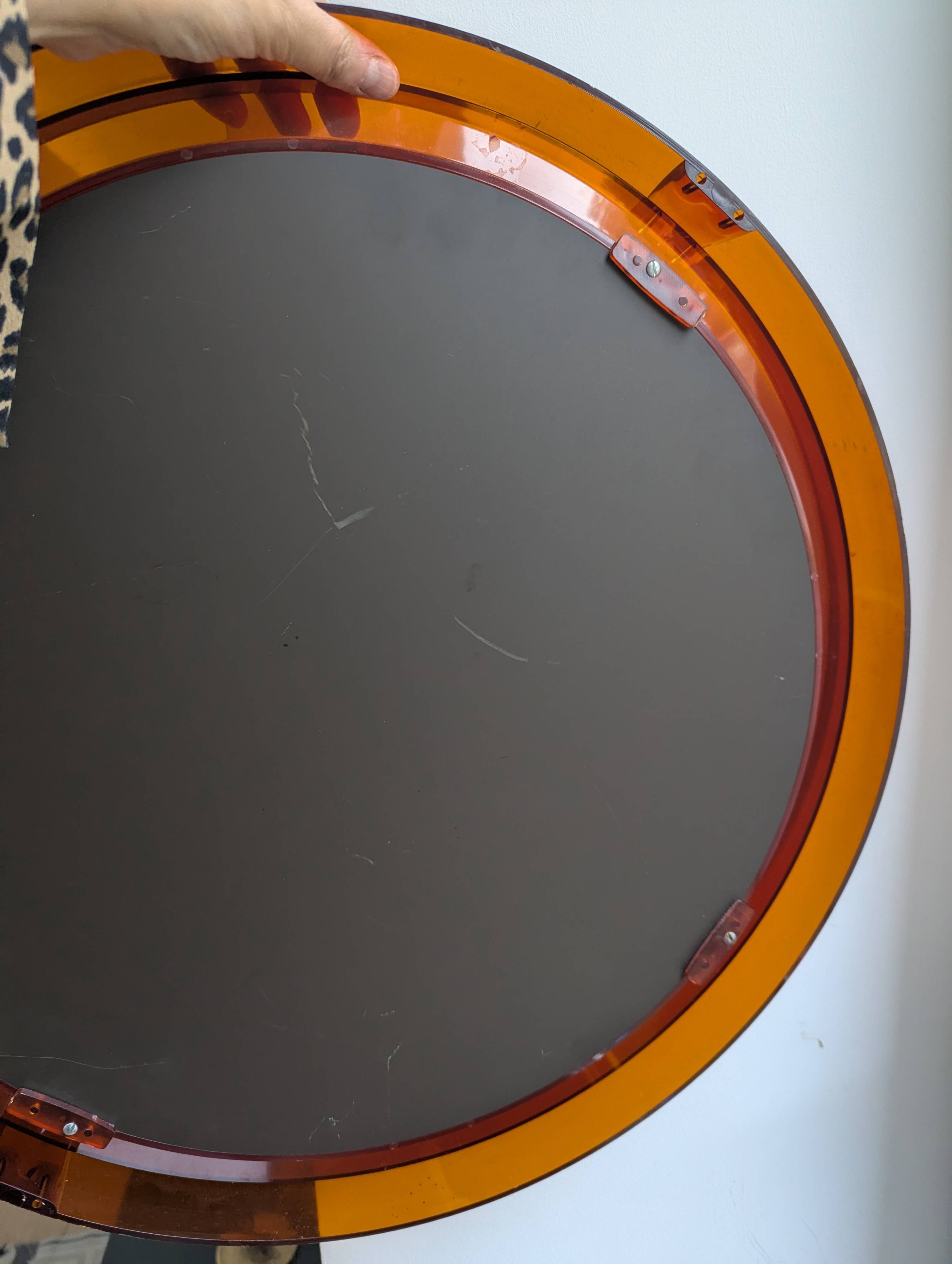 Vintage round orange plexiglass mirror Space Age 1970s