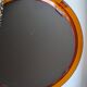 Vintage round orange plexiglass mirror Space Age 1970s
