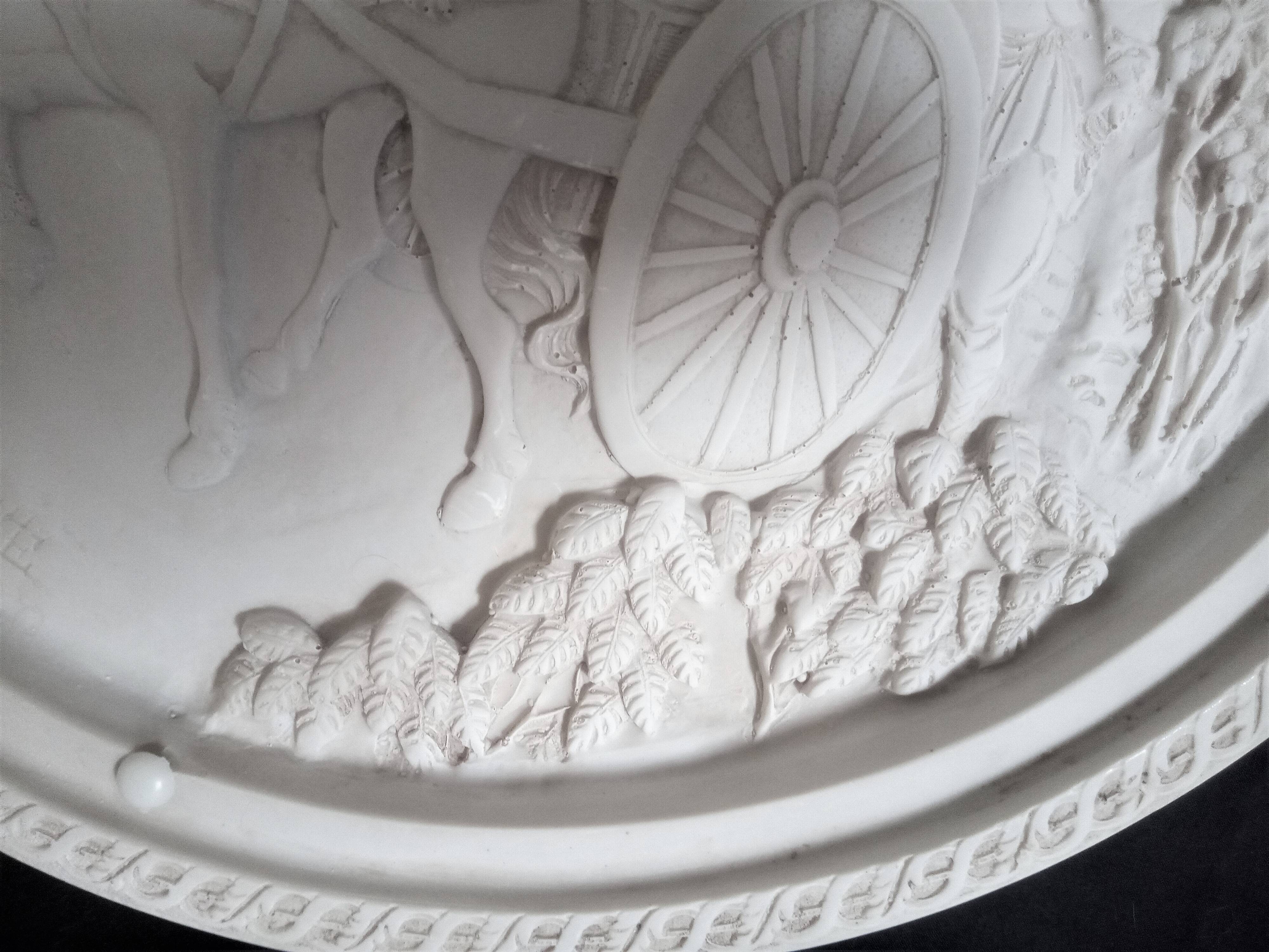 Large Chinese resin dish, sculpted motifs, signed