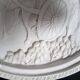 Large Chinese resin dish, sculpted motifs, signed