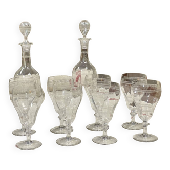 Crystal service from the early 20th century including 8 stemmed glasses and 2 carafes