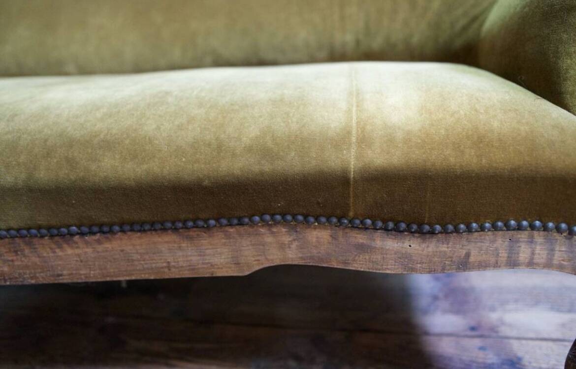 Three-seater velvet canapé in green, Louis Philippe style, 19th century.