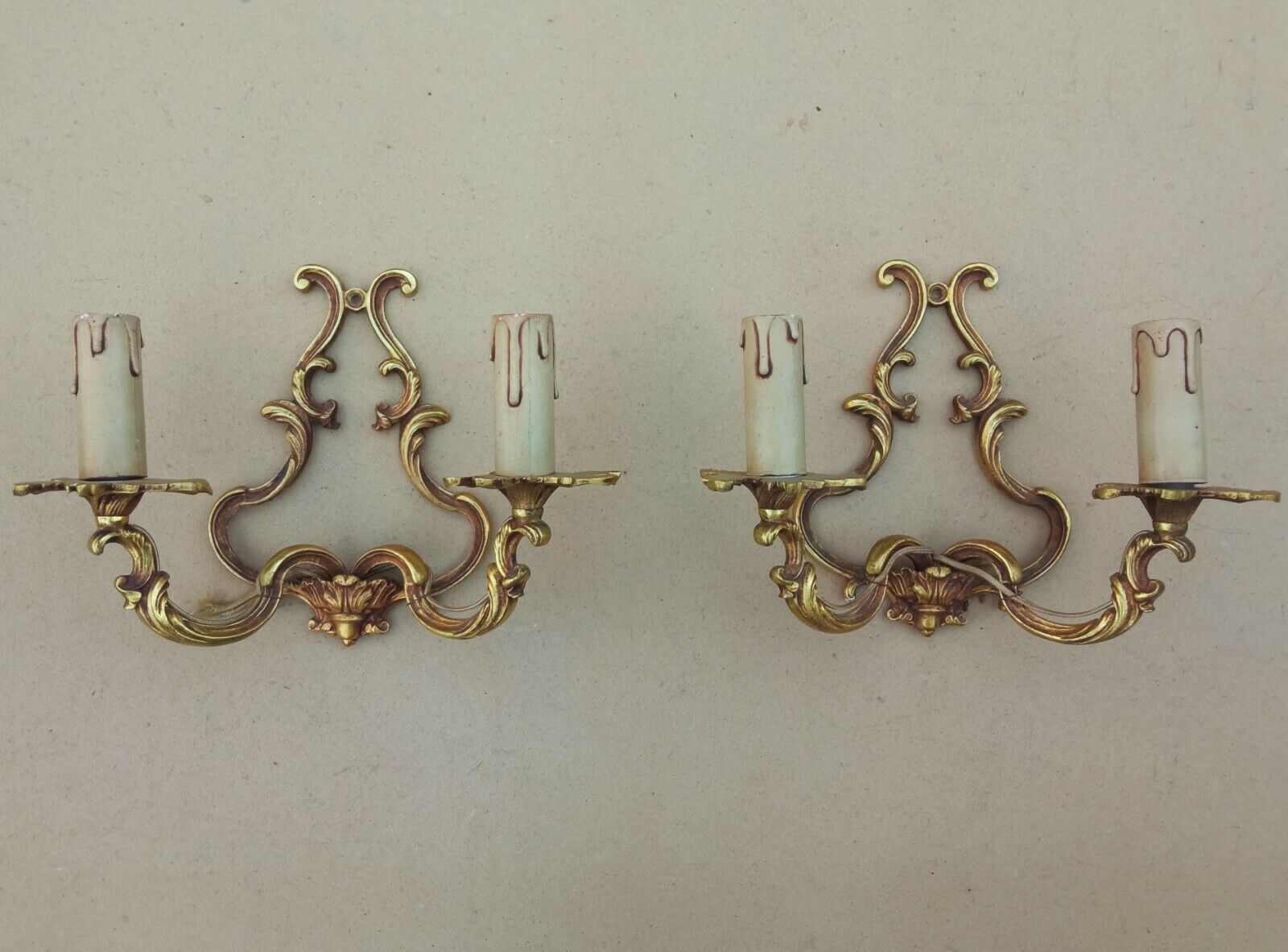 Pair of Louis XV style bronze cage wall lamps