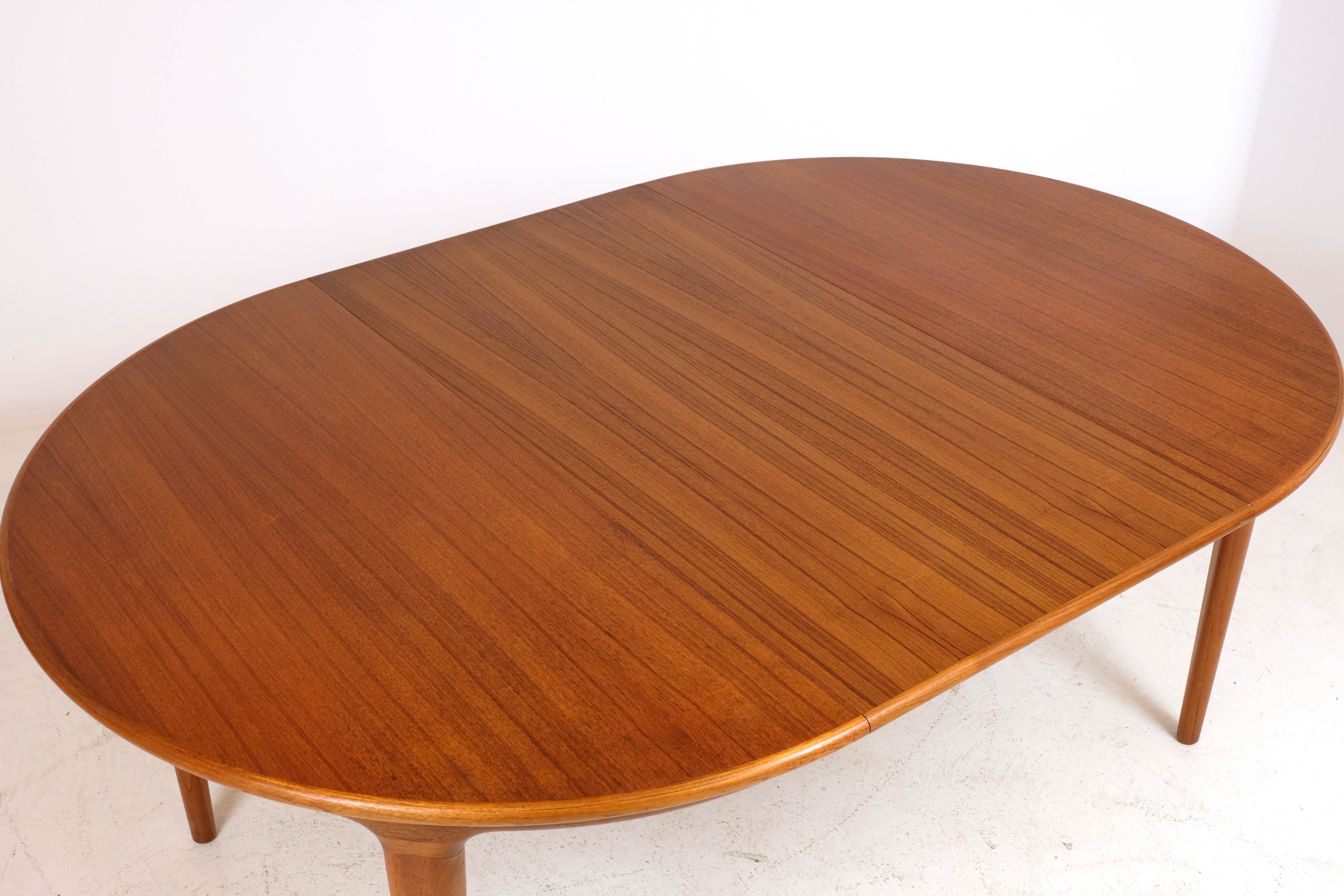 Teak extension table by J. Andersen for Uldum 1960