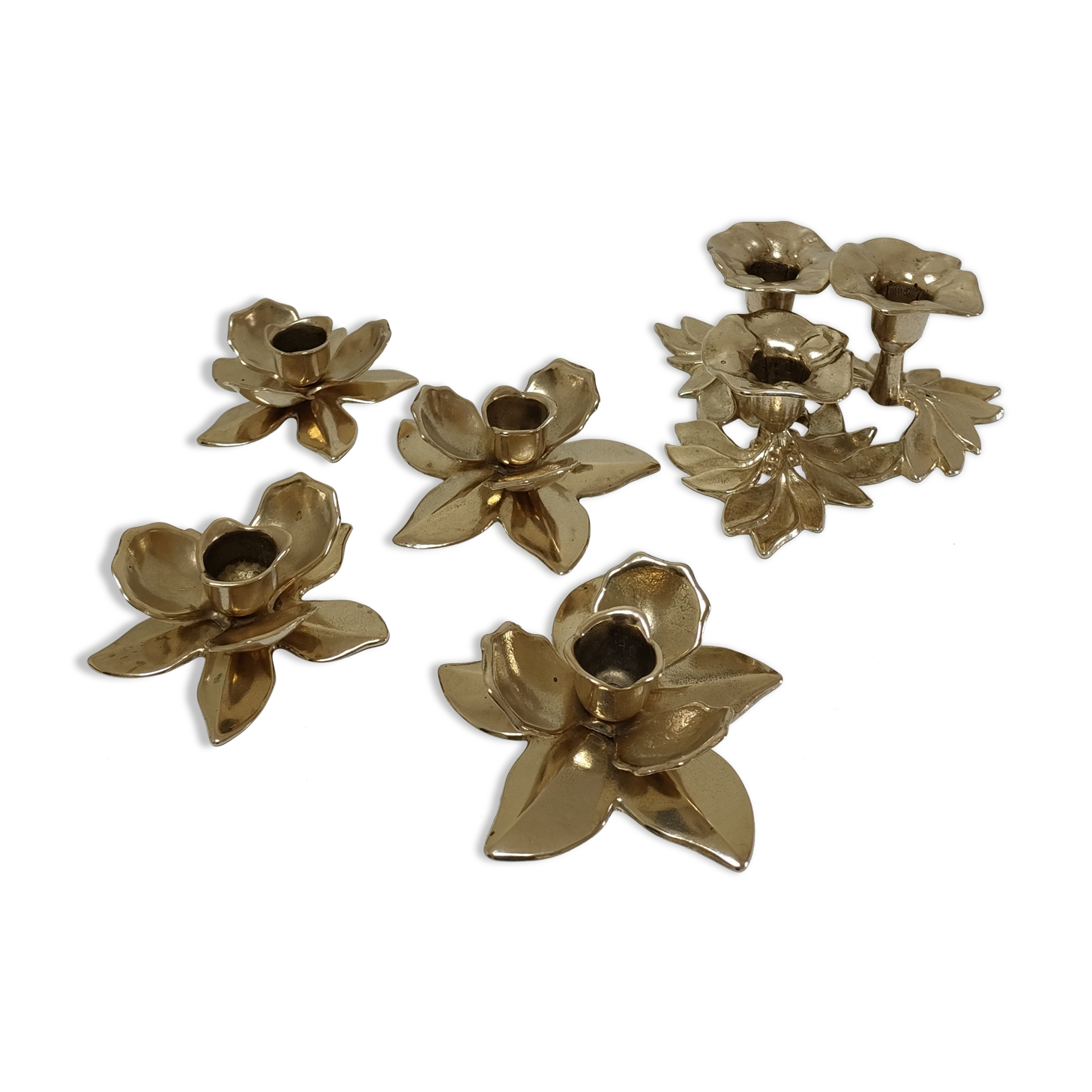 Five vintage solid brass flower candle holders