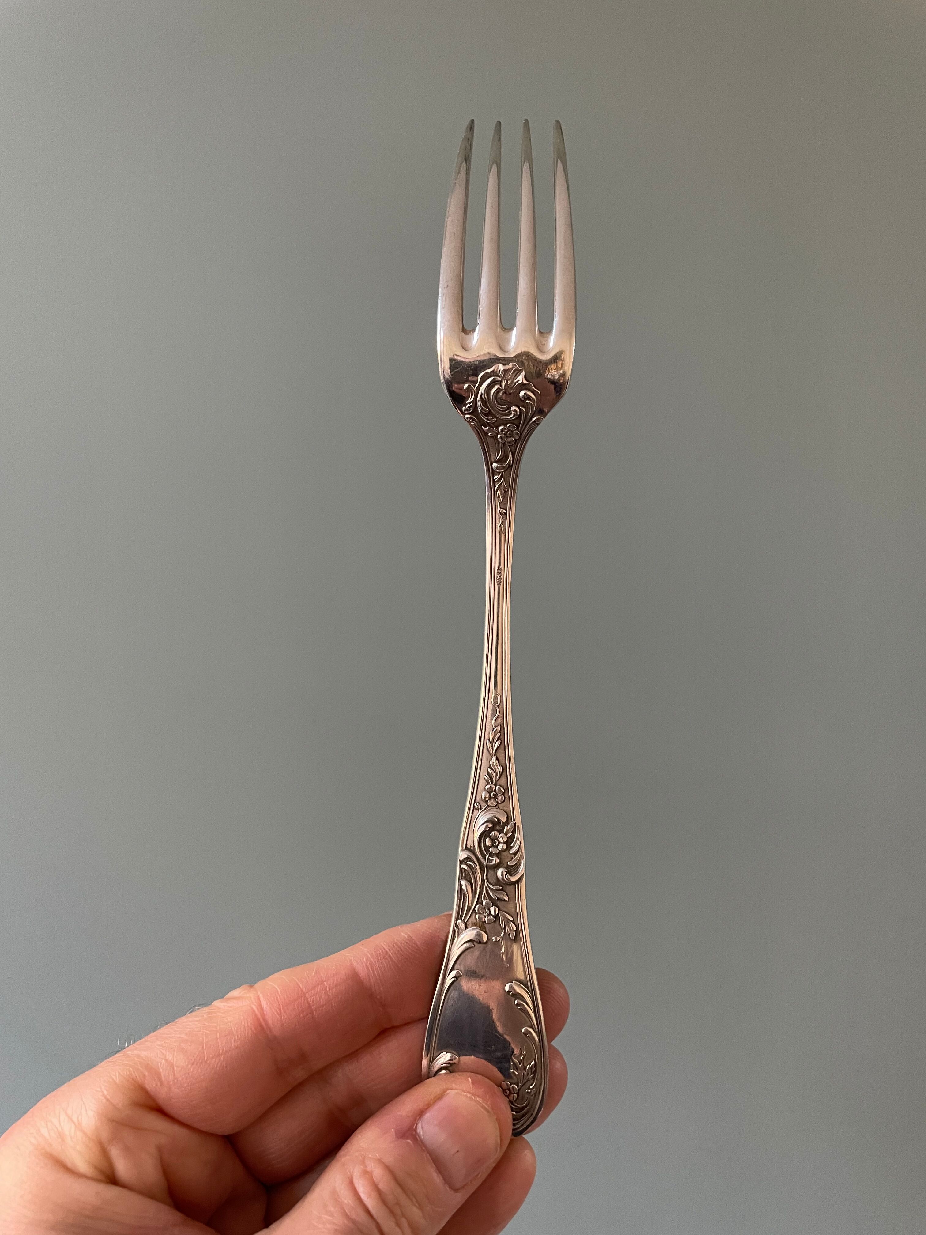 Series of 21 antique silver metal table forks