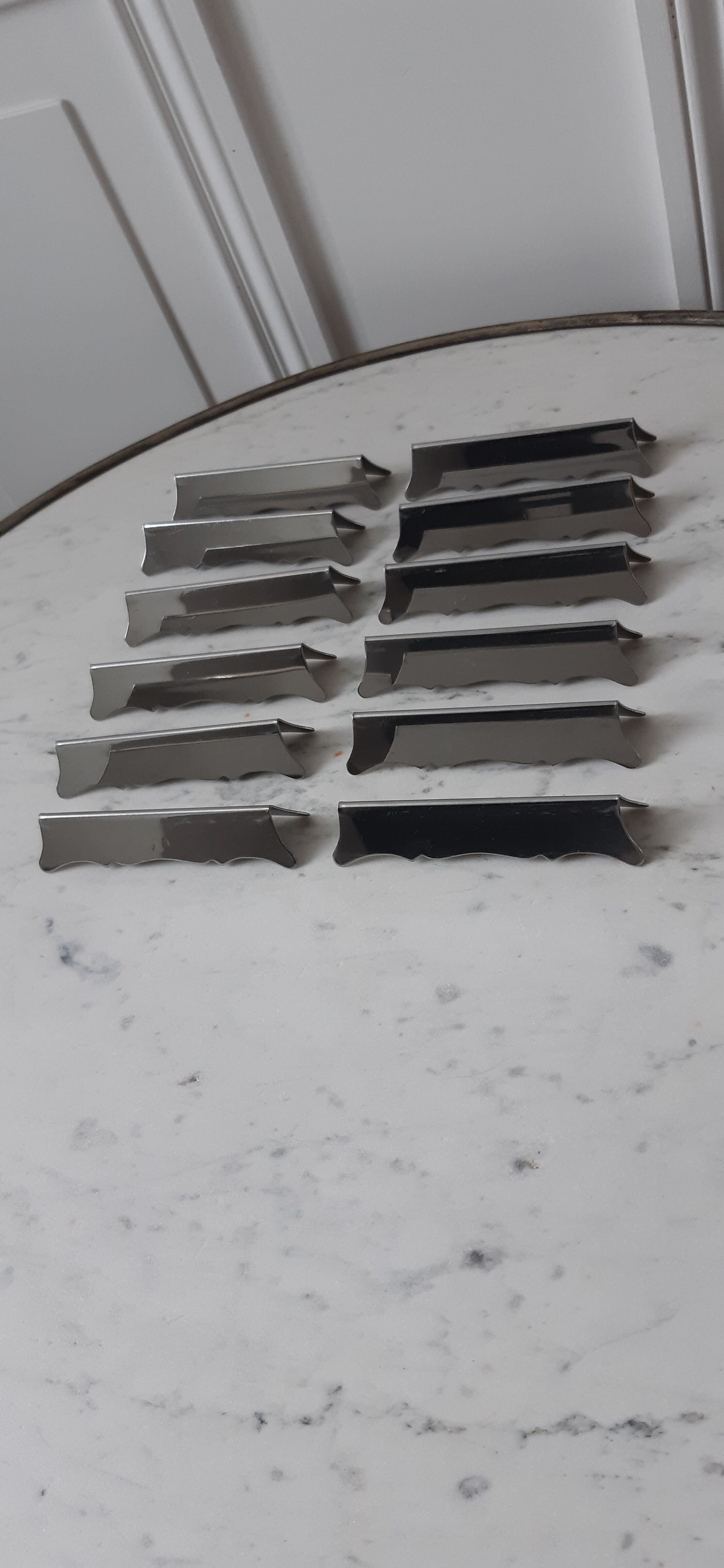 Set of 12 steel knife holders 50s