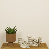 Set of two antique porcelain candle holders
