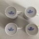 4 coffee cups and saucers