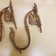 Pair of gilt bronze pegs