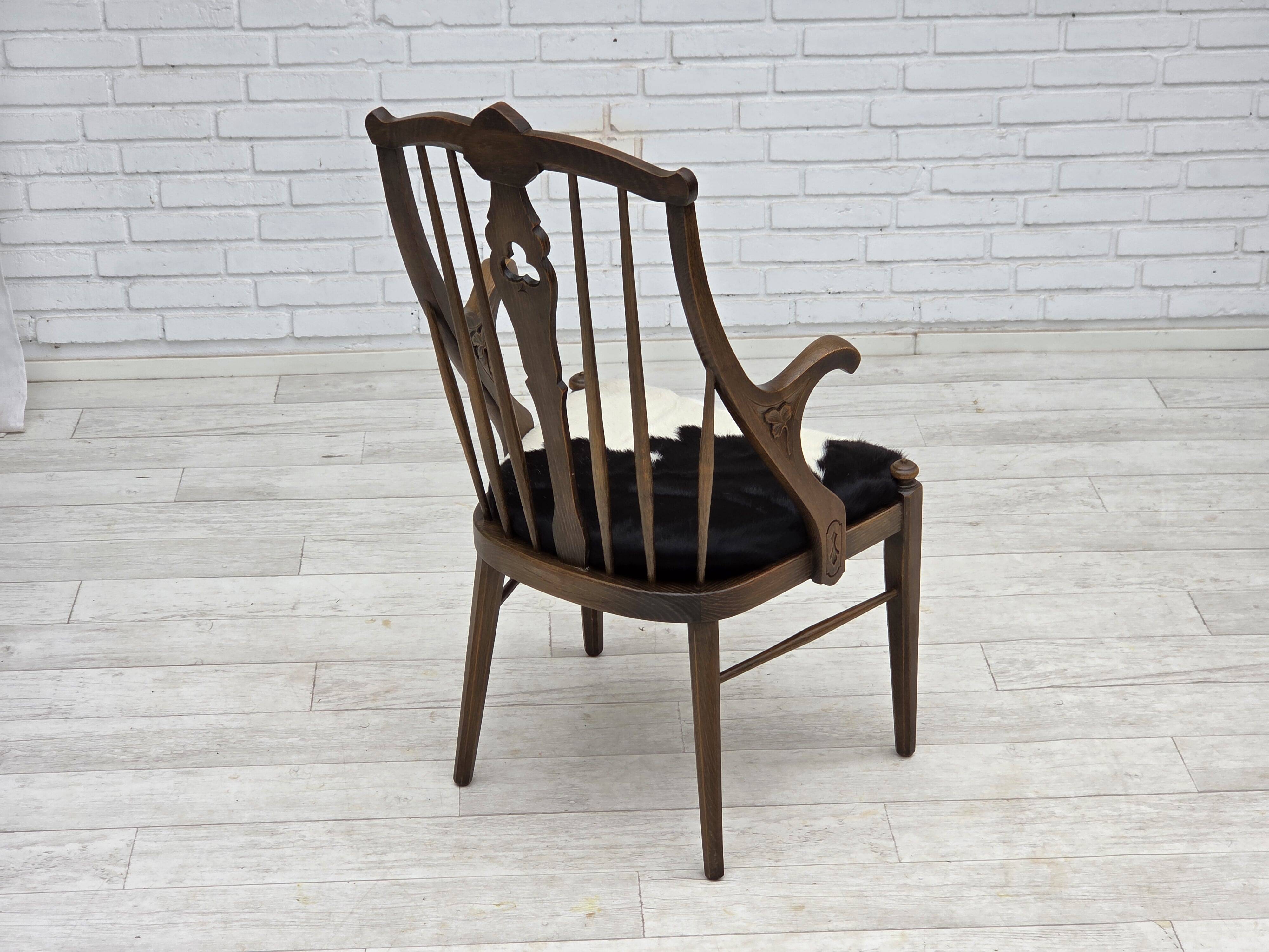 1960s, Danish high-backed armchair, reupholstered, furniture cowhide, oak.