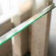 Glass & travertine dining table by Willy Ballez
