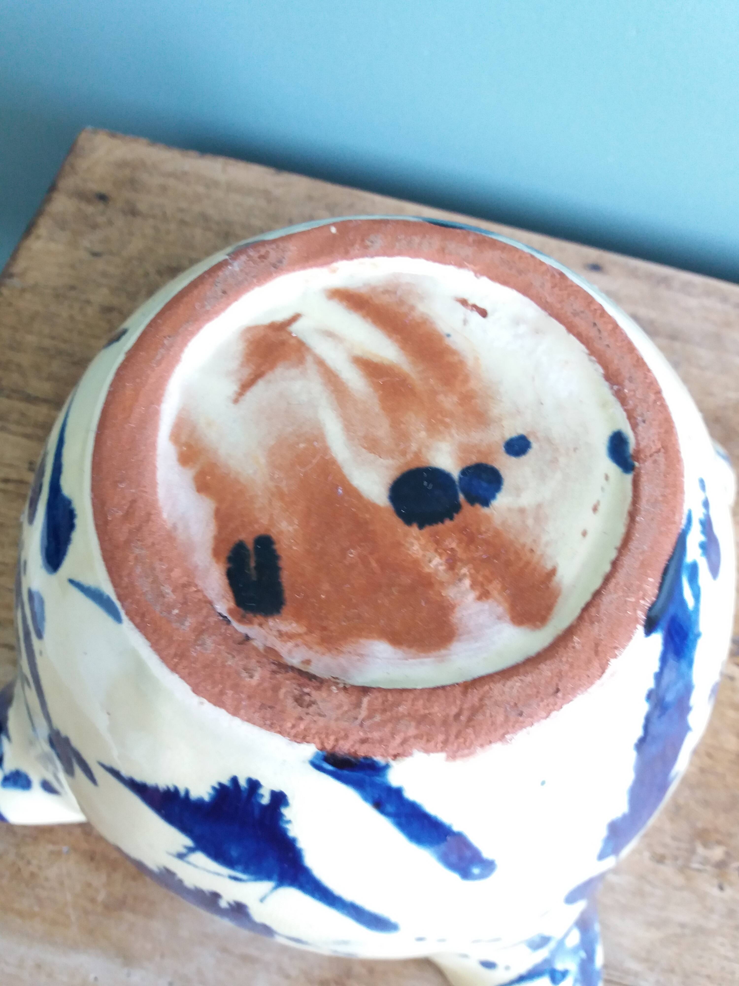 Glazed terracotta mortar and wooden pestle