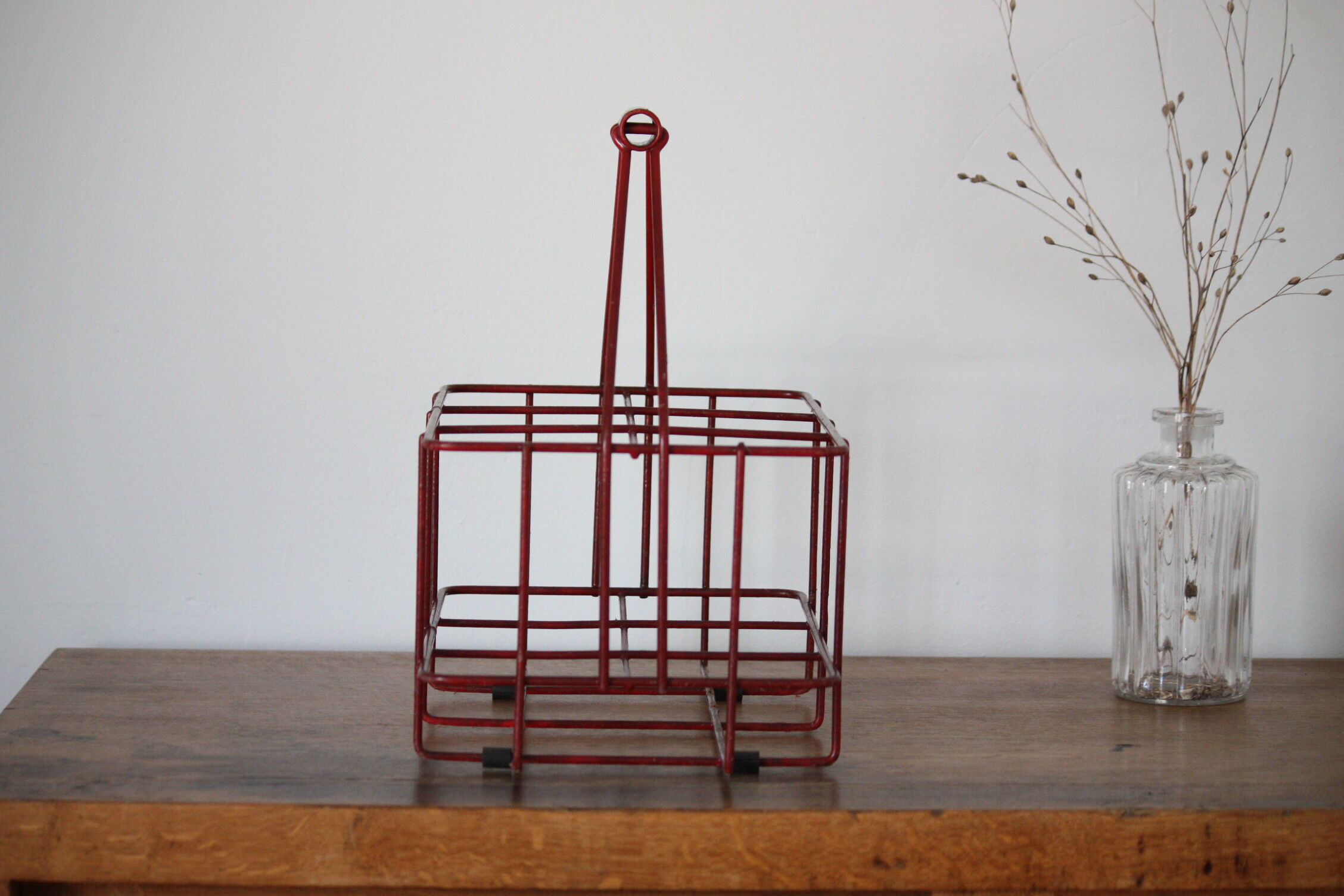Red metal bottle holder