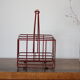 Red metal bottle holder