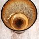 Set of four thick amber glass stemmed glasses.
