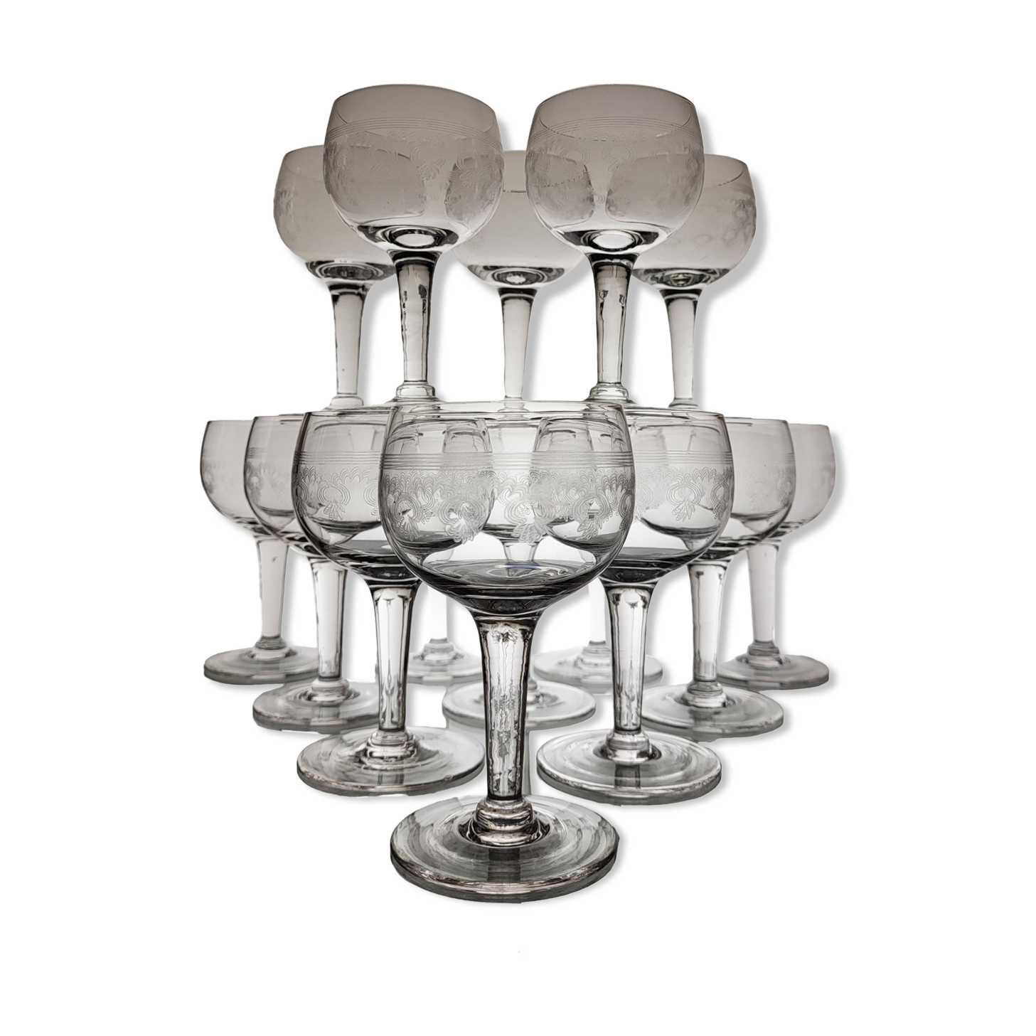 9 guilloche wine glasses, early 20th century