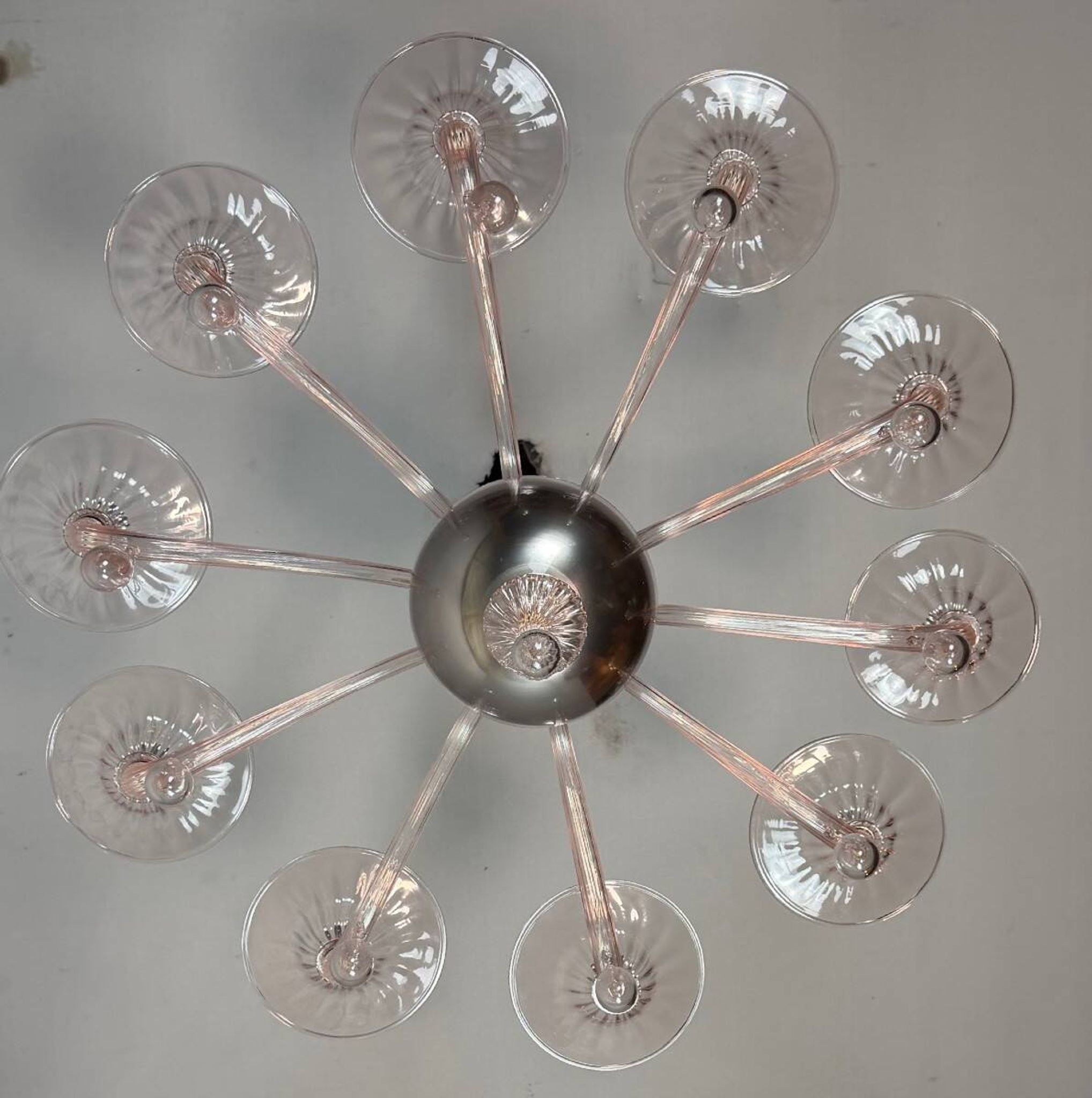 Venetian glass lustre in pink, in the style of Venini.