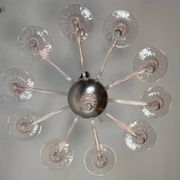Venetian glass lustre in pink, in the style of Venini.