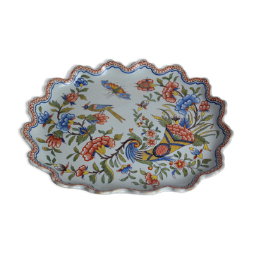Desvres faience plate with polychrome decoration of a cornucopia.