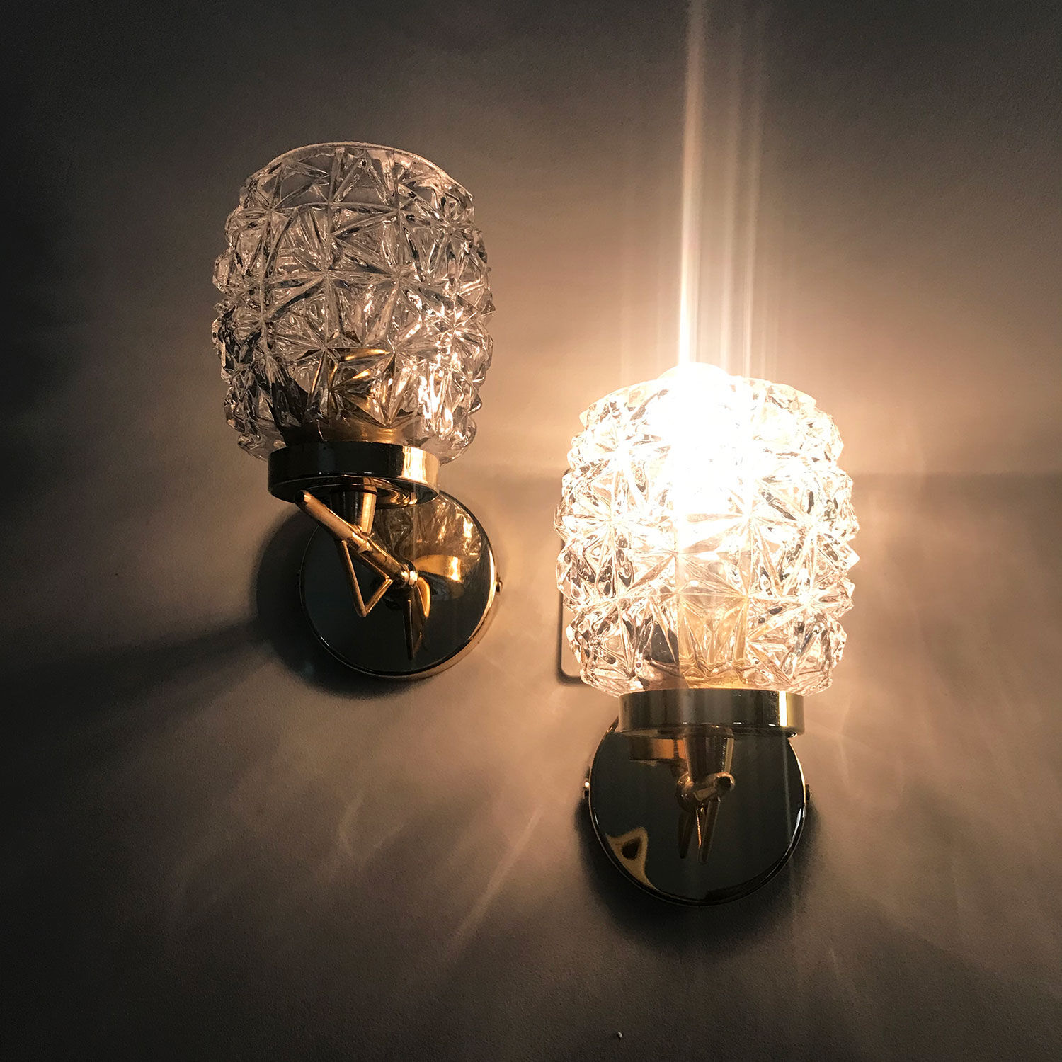 Pair of glass and brass wall lamps