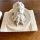 Two moulds; plaster heads
