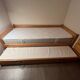 Vintage solid pine trundle bed