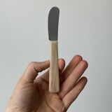 Pink bakelite butter knives.