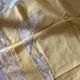 Tablecloth and 12 straw-colored napkins from the 50s.