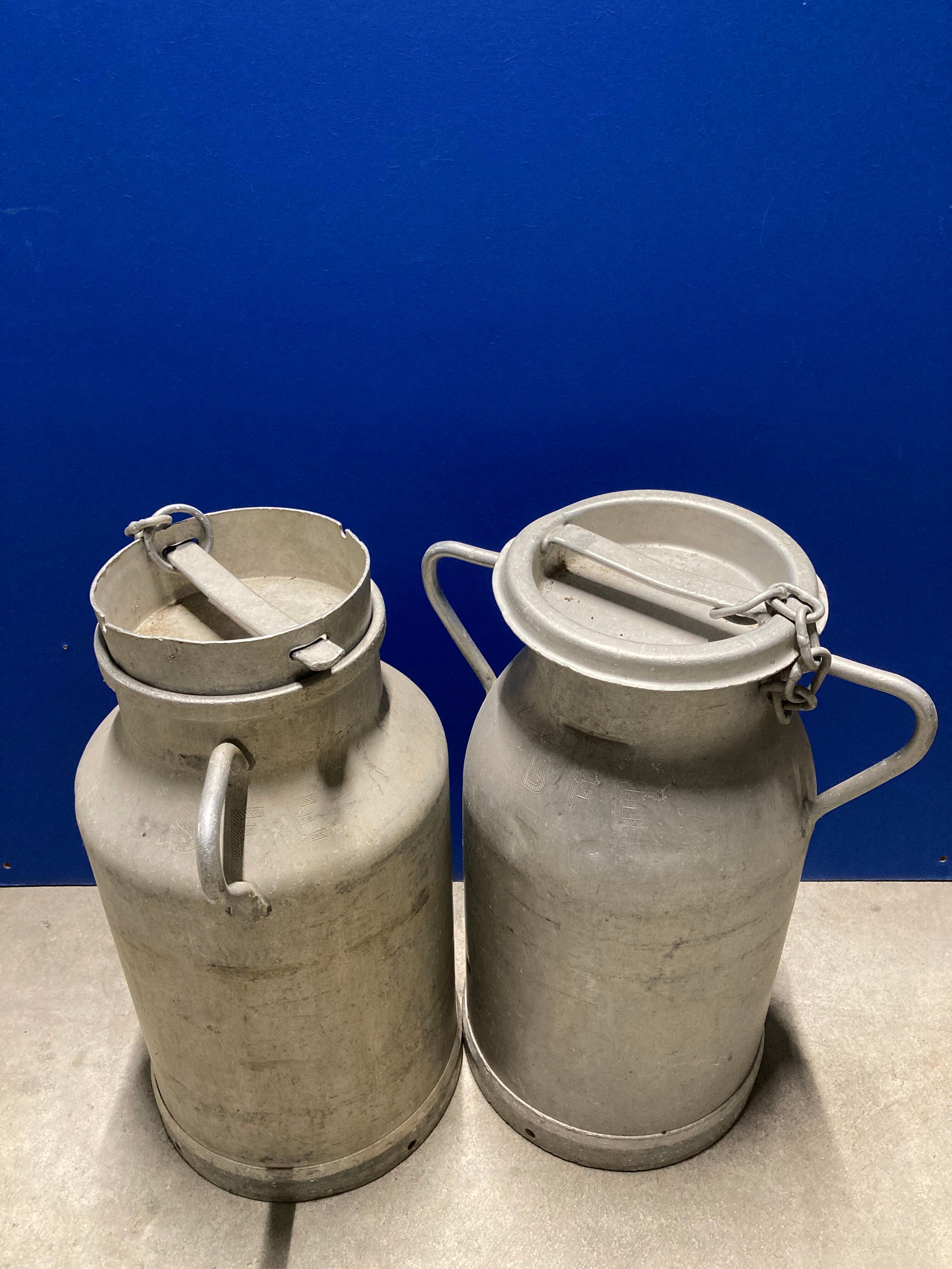 Pair of farm milk jars aluminum cans