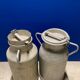 Pair of farm milk jars aluminum cans