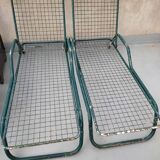 Pair of metal deckchairs