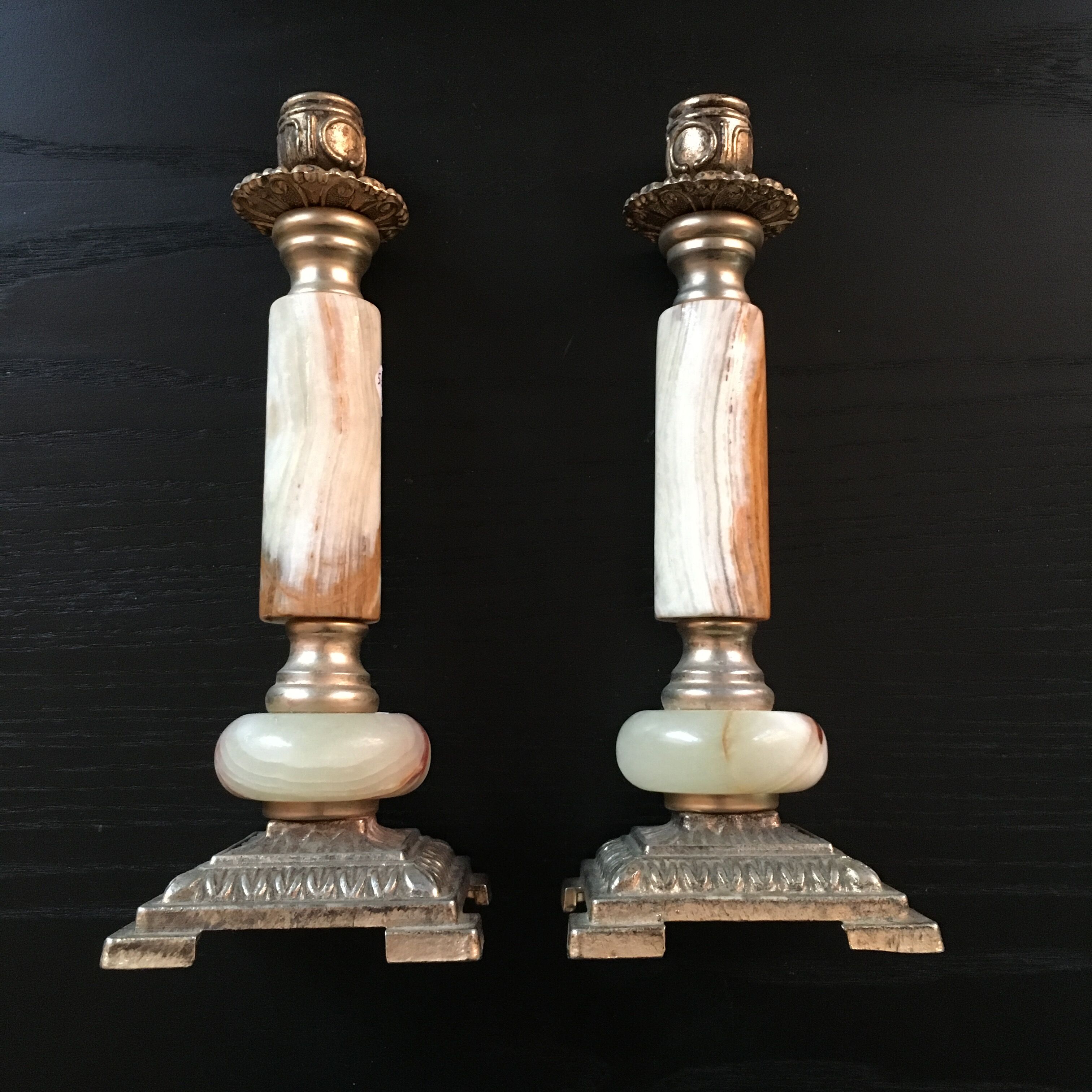 Pair of alabaster and brass candle holders