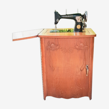 Cosson sewing machine built into a 1940 wooden cabinet
