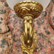 Pair of bronze wall lamps and frosted glass globe, early twentieth century.