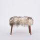 Danish Mid-century Modern stool reupholstered in white and black sheep skin