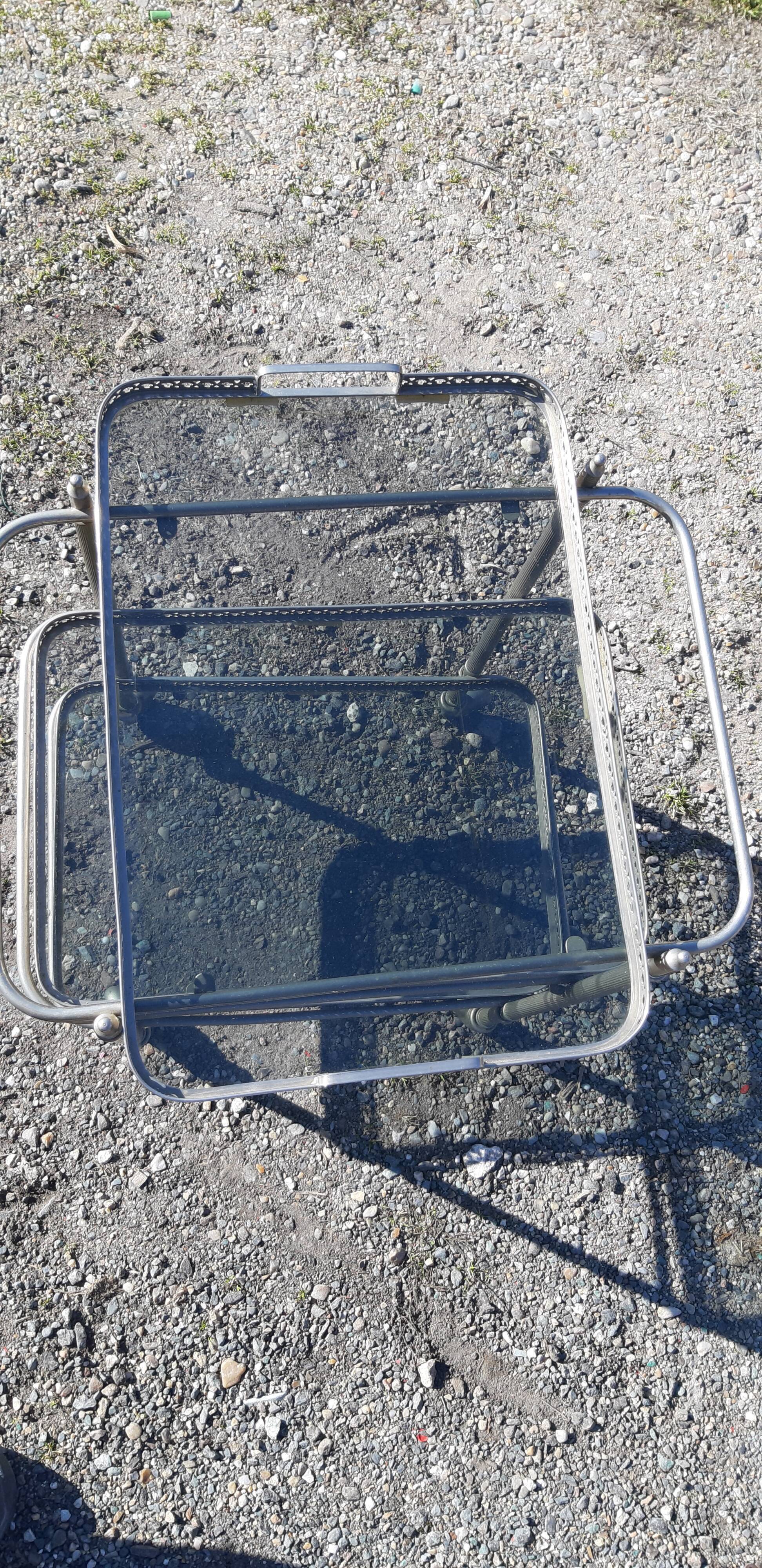 Rolling service silver metal and bluish glass