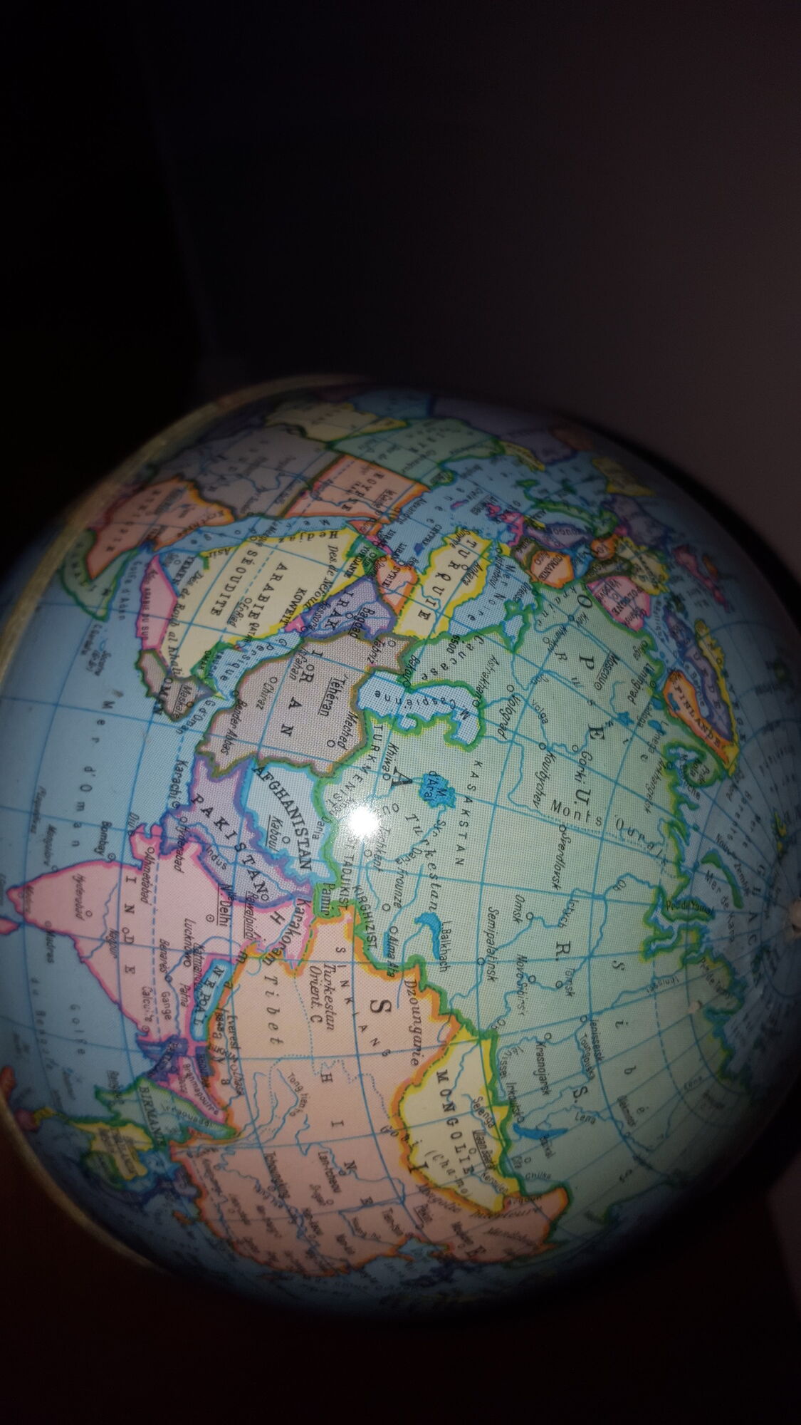 Bright vintage Earth globe brand Vulliermes with metal tripod foot