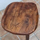 Low tripod stool in solid wood, design by Henri Bataille, 35 cm