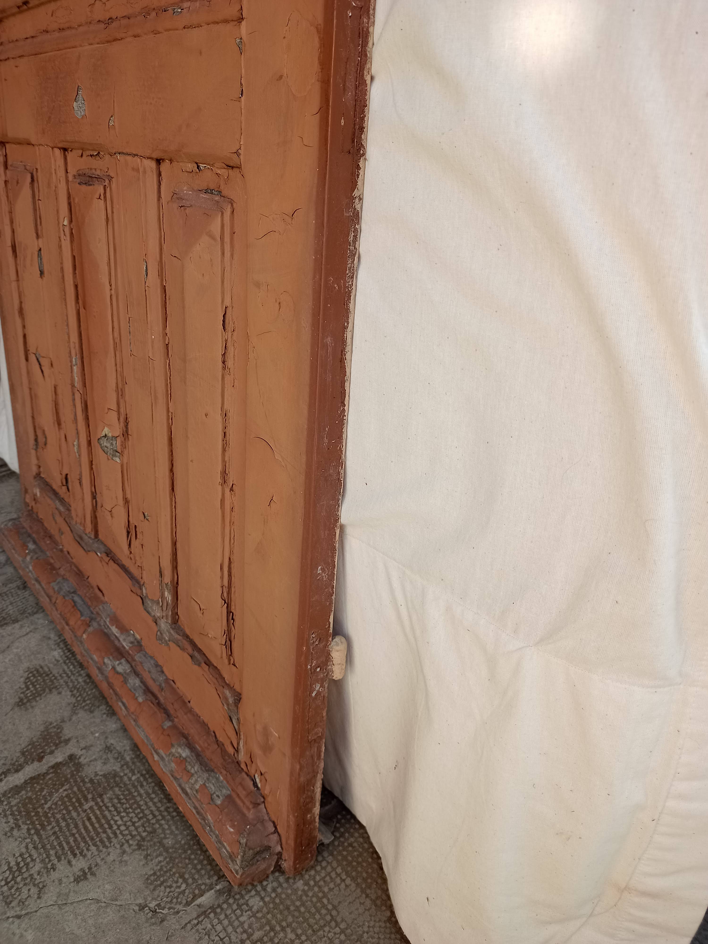 Old glazed door with its shutter