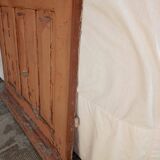 Old glazed door with its shutter