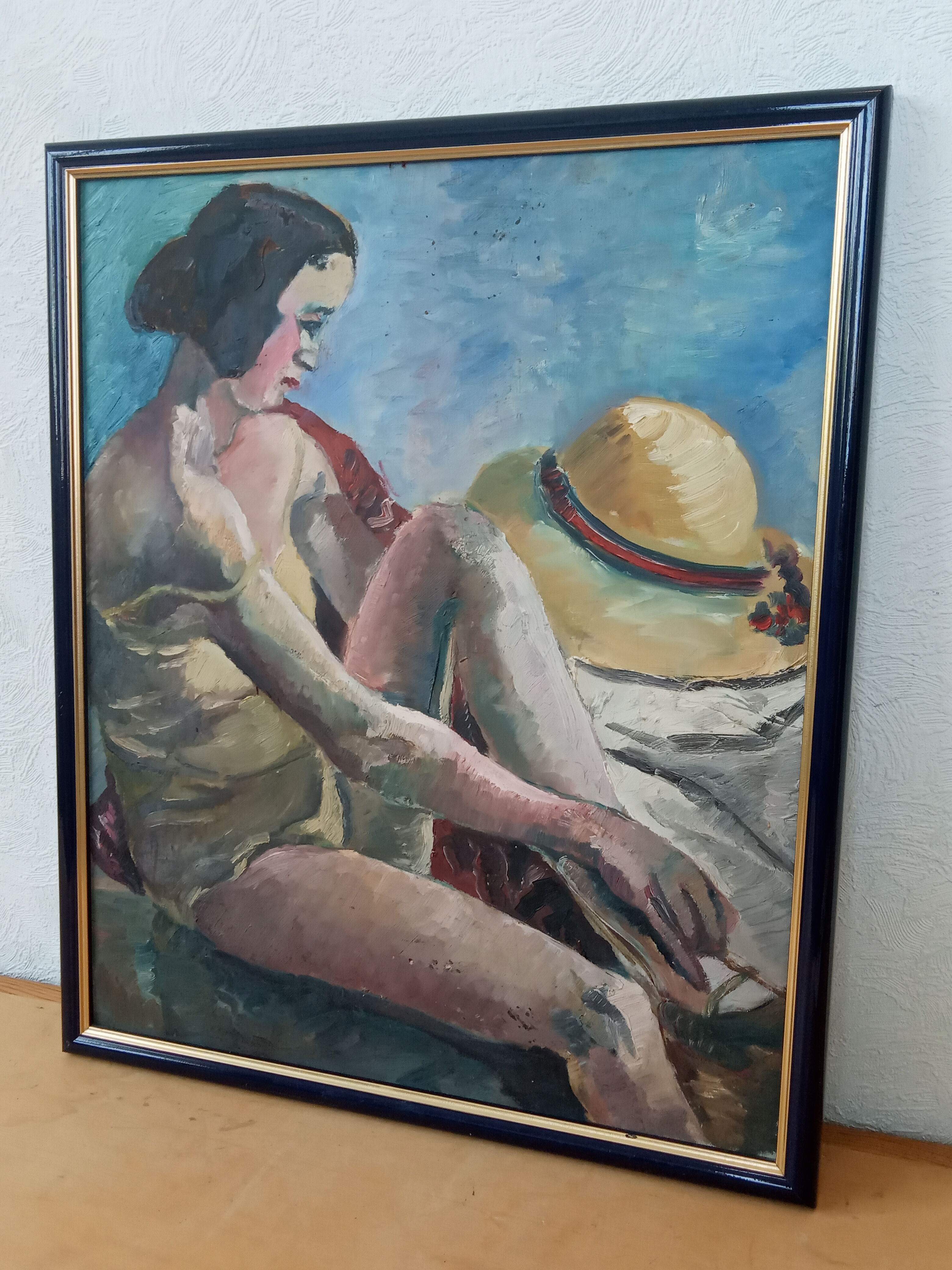 Portrait of a young woman in the hat