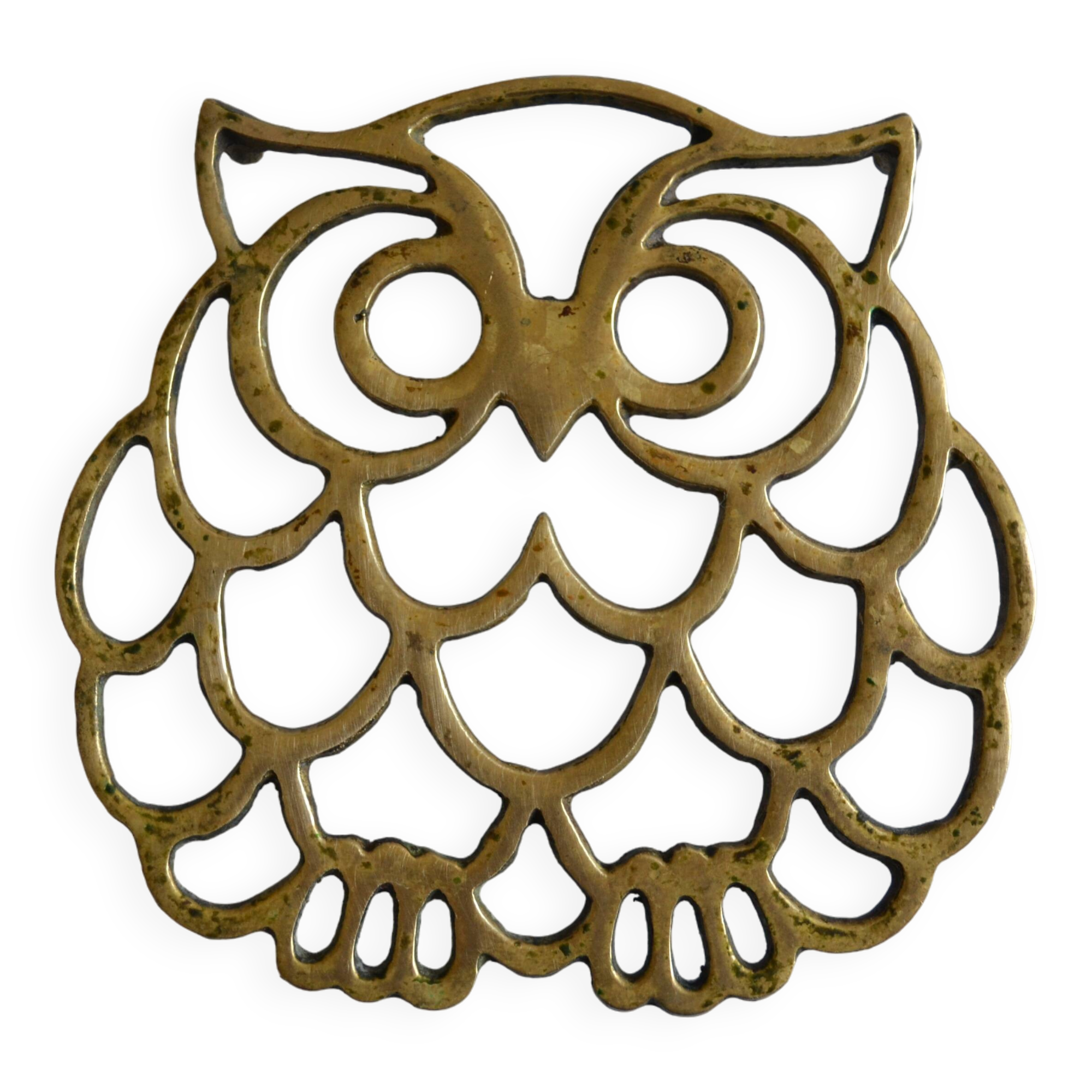 Vintage openwork brass trivet in the shape of an owl or owl